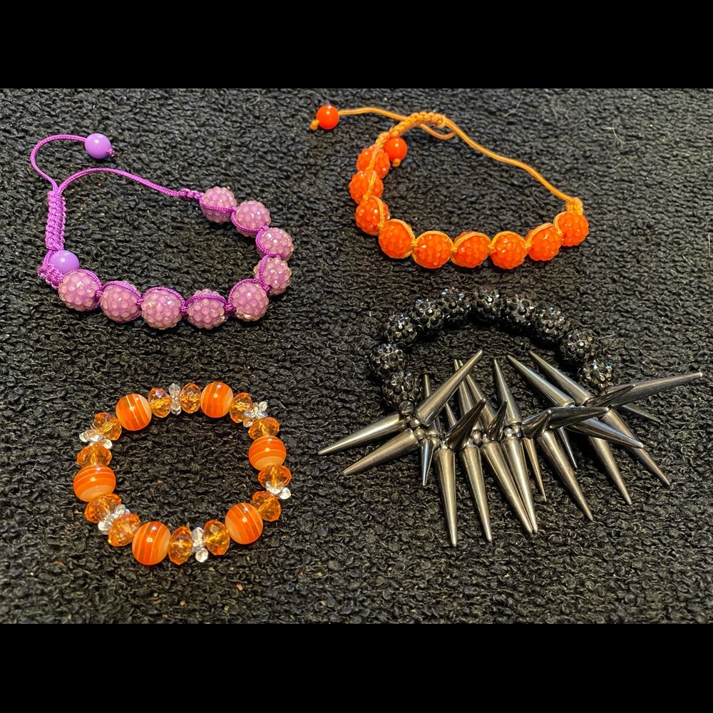 Assortment of plastic jeweled bracelets
